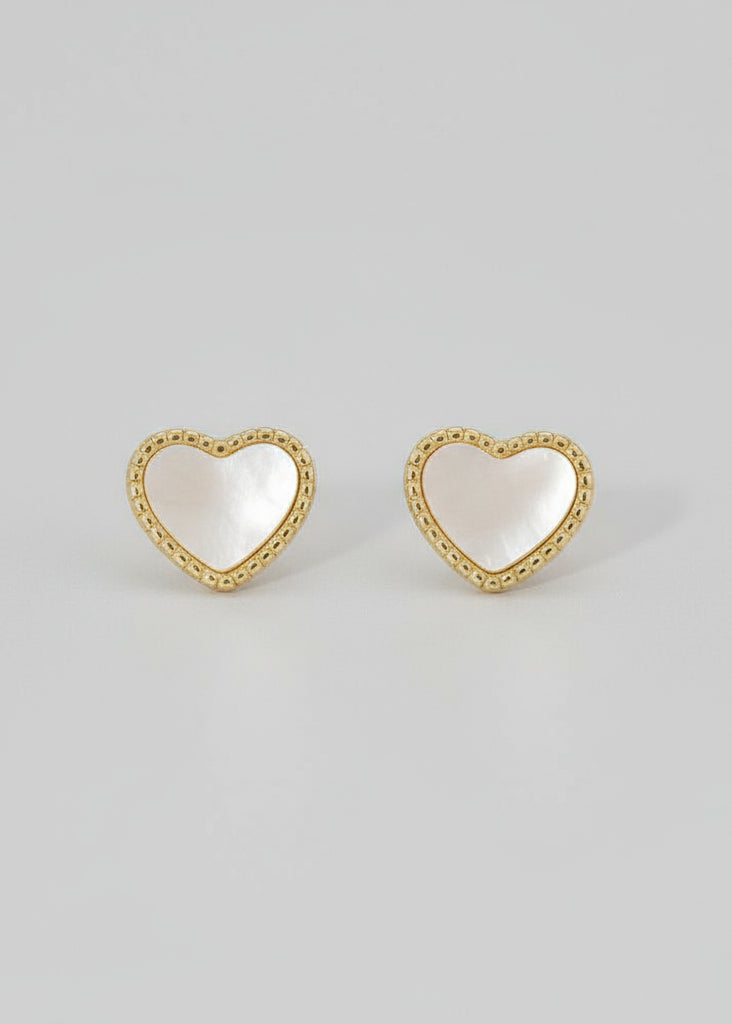 Gold-dipped heart-shaped earrings on a white card with text.