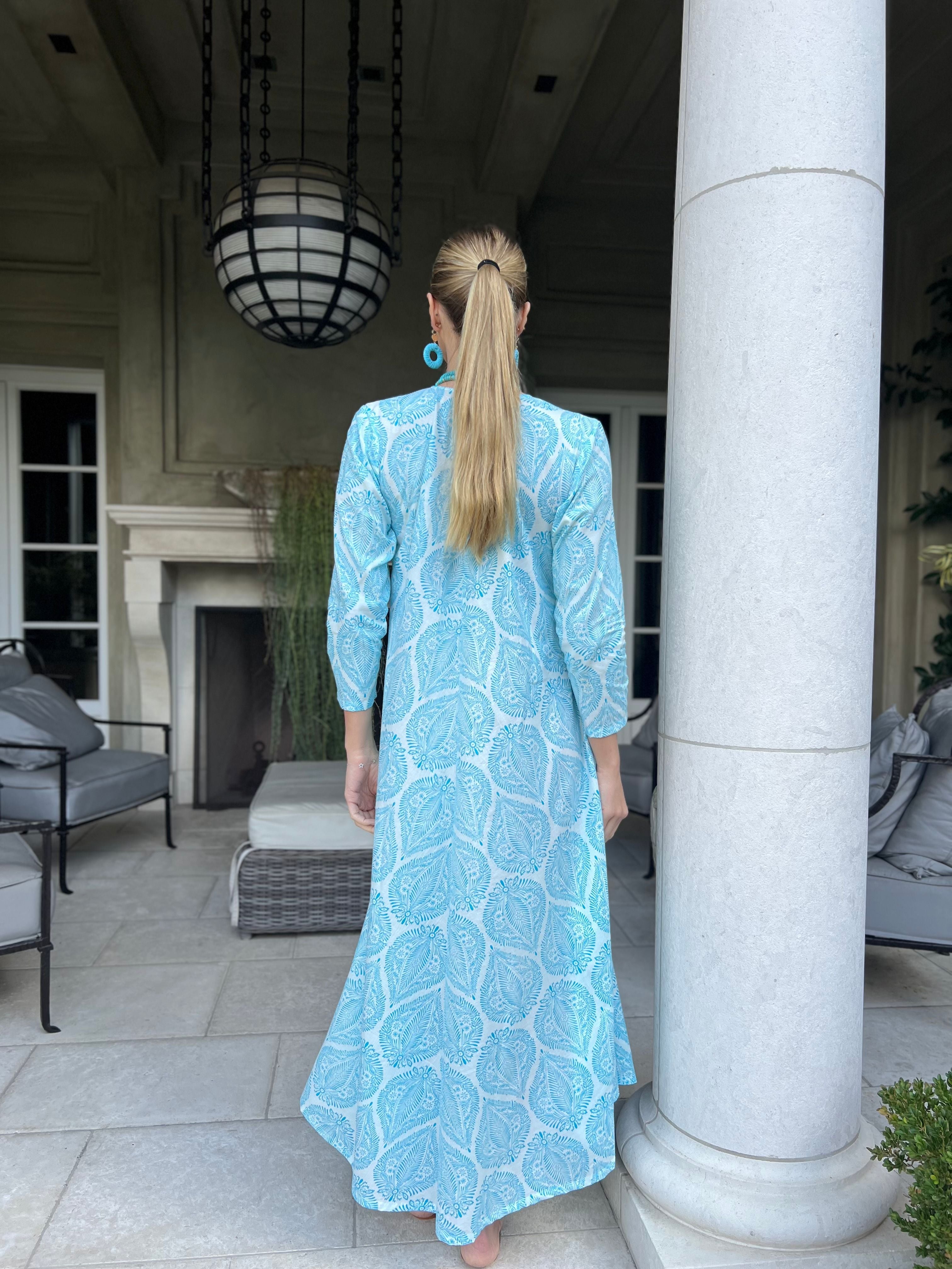 blue flowy maxi dress & white wave CHICA del Sur This dress is the perfect way to stay comfortable and stylish throughout the season Bright From Within Blue Maxi