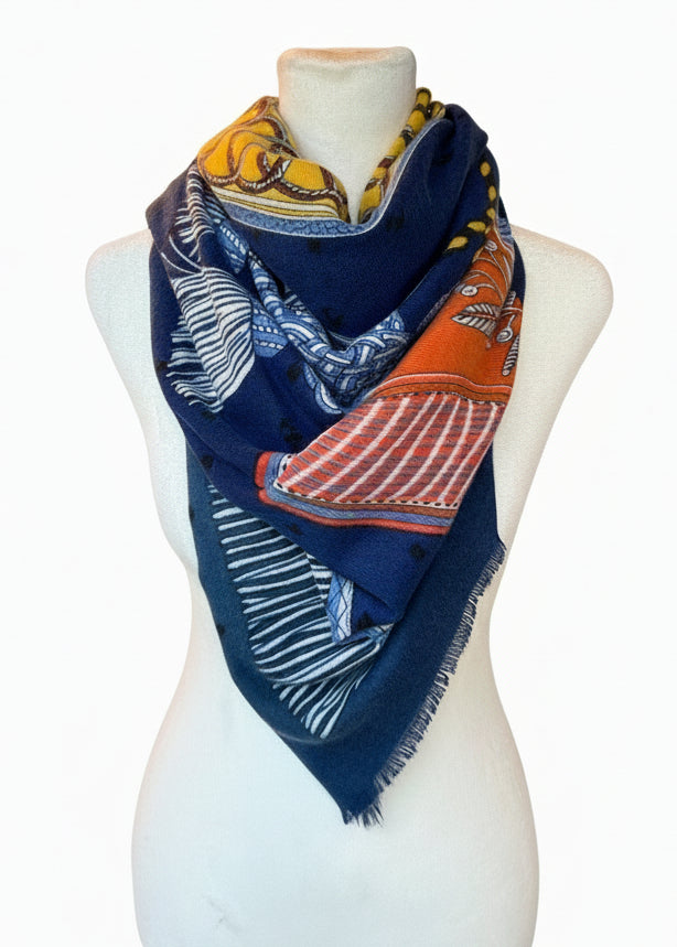 Colorful patterned scarf on a mannequin bust in a warehouse setting