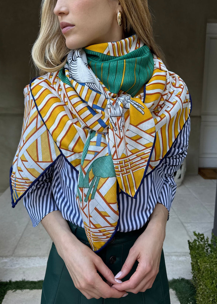 Woman wearing a colorful patterned scarf outdoors