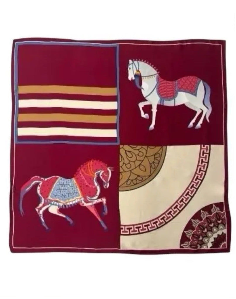 Fabric swatch with horse design on a red background