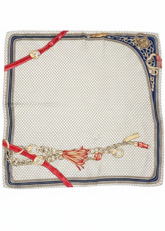 Decorative belt with charms on a textured surface