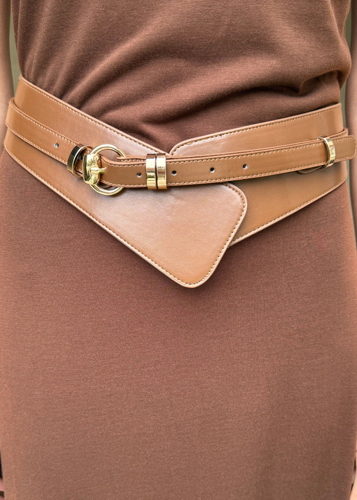 Brown leather belt with gold buckle on a brown dress
