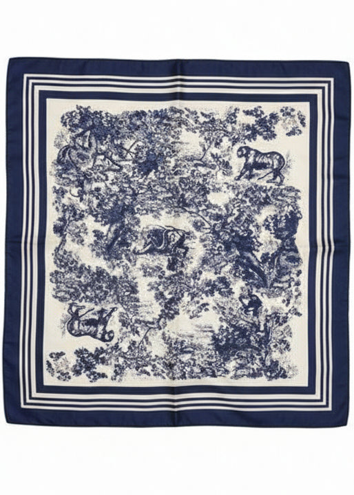 Navy and white patterned scarf on a white surface
